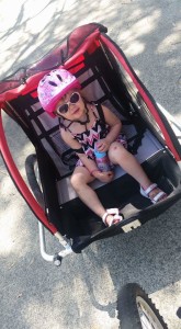 daughter in bike trailer